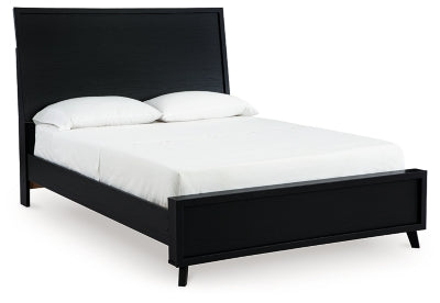 Ashley Furniture Danziar Bed in a stylish angle view showing the headboard and frame with elegant design details.