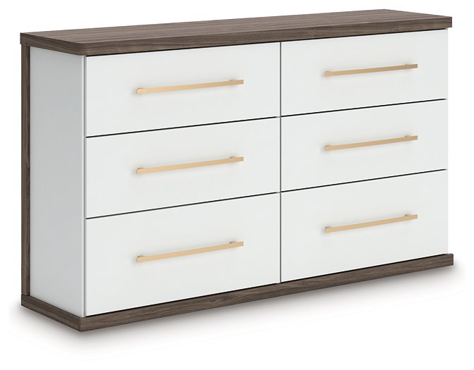 Ashley Furniture Kendanport Dresser in dark wood finish, angled view showing multiple drawers and sleek design.