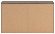 Ashley Furniture Kendanport Dresser with sleek wood finish and multiple drawers, shown from the back view.