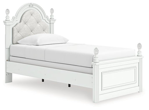 Ashley Furniture Kozlani upholstered bed with a plush headboard and neutral fabric, shown from a side angle in a modern bedroom setting.