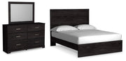 Ashley Furniture Belachime bedroom set with a modern bed frame, matching nightstands, and coordinated bedroom furniture.