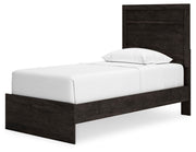 Ashley Furniture Belachime bedroom set with a modern bed frame, matching nightstands, and coordinated bedroom furniture.