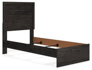 Ashley Furniture Belachime bedroom set featuring a modern bed frame with matching nightstands and dresser in a stylish bedroom.