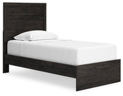 Ashley Furniture Belachime bedroom set with a stylish bed frame, nightstands, and dresser in a modern bedroom setup.