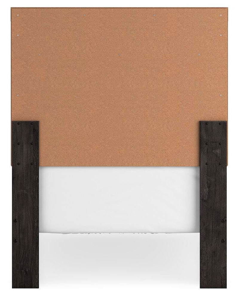 Ashley Furniture Belachime bedroom set with a modern bed frame, nightstands, and matching dresser in a stylish bedroom setting.