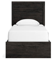 Ashley Furniture Belachime Bedroom Set with a headboard and matching bedroom furniture in a modern design.