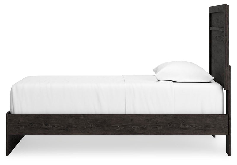 Ashley Furniture Belachime bedroom set featuring a bed, nightstands, and dresser with modern design and warm wood finish.