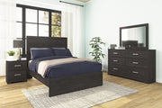 Ashley Furniture Belachime bedroom set with a stylish bed frame, matching nightstands, and coordinated bedroom furniture.