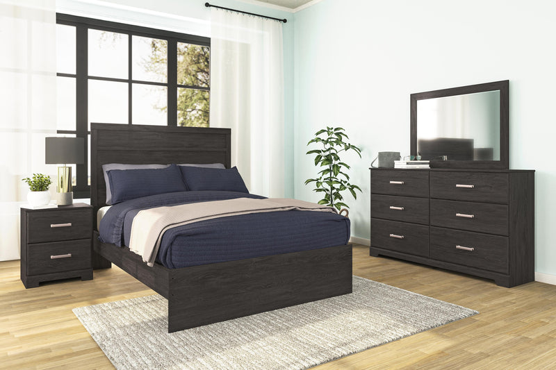 Ashley Furniture Belachime bedroom set with a stylish bed frame, matching nightstands, and coordinated bedroom furniture.