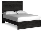 Ashley Furniture Belachime bedroom set featuring a modern bed frame with matching nightstands and dresser in a stylish bedroom scene.