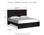 Ashley Furniture Belachime bedroom set with a modern wooden bed frame, matching nightstands, and elegant decor in a stylish bedroom.