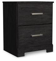 Ashley Furniture Belachime bedroom set with a stylish bed frame, nightstands, and dresser in a cozy, modern bedroom setting.
