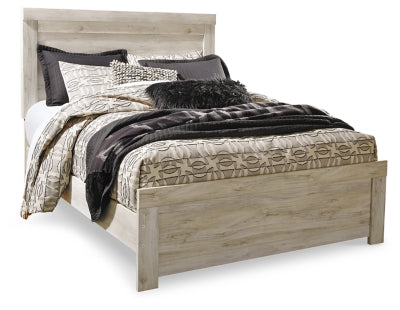 Ashley Furniture Bellaby bed with a wooden frame and headboard, shown in a stylish bedroom setting.