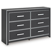 Ashley Furniture Zuraleus dresser with sleek wood finish and multiple drawers, shown from an angled view.