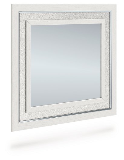 Ashley Furniture Zuraleus bedroom mirror with a sleek framed design, viewed from an angle showing its stylish structure.