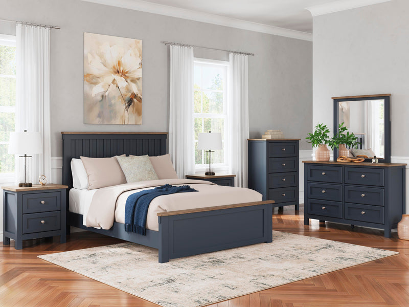 Ashley Furniture Landocken bedroom set with bed, dresser, and nightstands in a coordinated bedroom package.