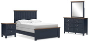 Ashley Furniture Landocken bedroom set with a bed, dresser, and nightstands in a modern bedroom design.