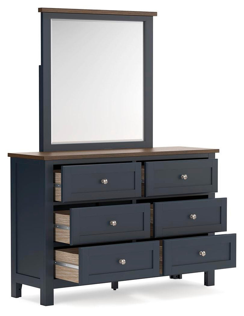 Ashley Furniture Landocken bedroom set with a bed, nightstands, and dresser in a modern bedroom arrangement.