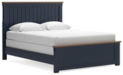 Ashley Furniture Landocken bedroom set with bed frame, nightstands, and dresser shown from an angled view in a modern bedroom scene.