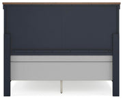 Ashley Furniture Landocken bedroom set with a bed, dresser, and nightstands in a stylish bedroom scene.