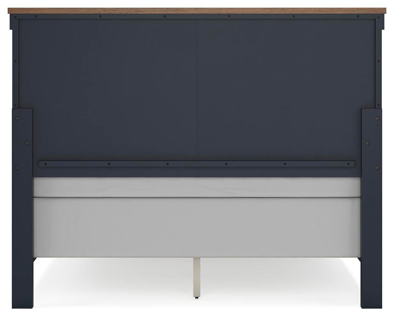 Ashley Furniture Landocken bedroom set with a bed, dresser, and nightstands in a stylish bedroom scene.