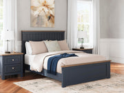 Ashley Furniture Landocken Bedroom Set featuring a stylish bed, matching nightstands, and coordinating dresser in a modern design.