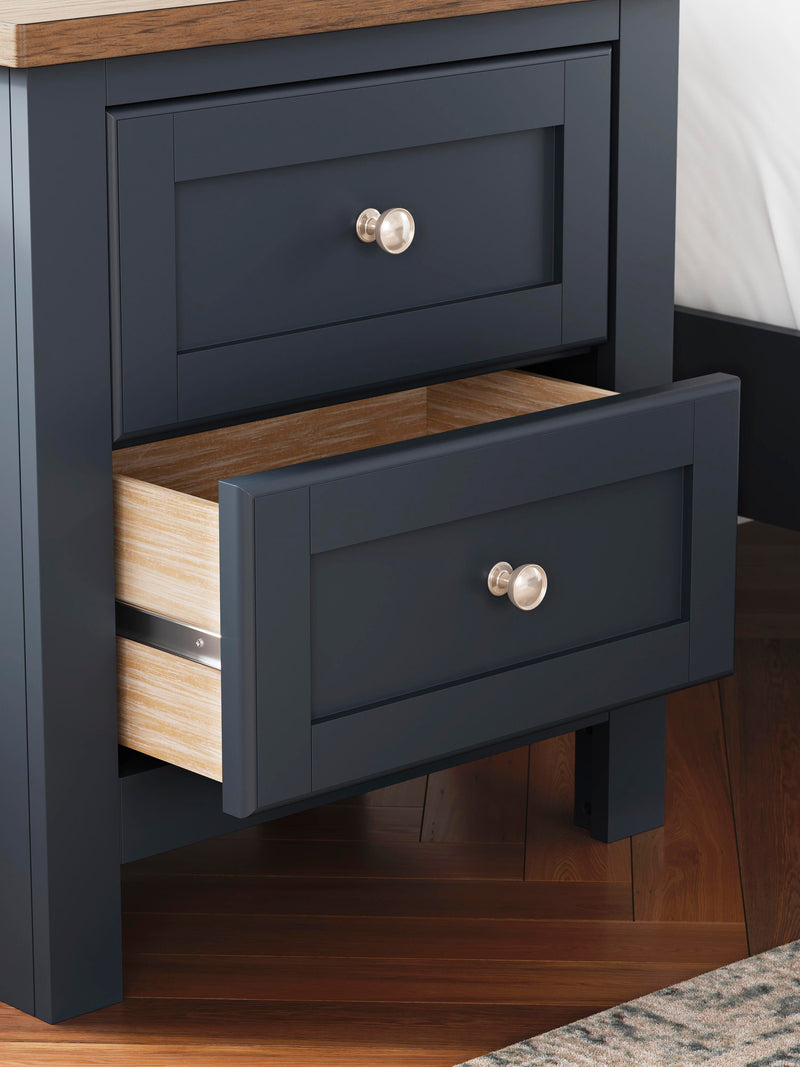Ashley Furniture Landocken Bedroom Set includes a bed frame, nightstands, and dresser in a modern bedroom design.