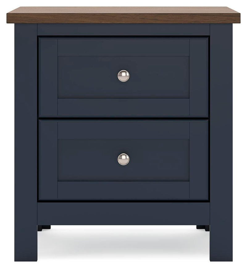 Ashley Furniture Landocken Bedroom Set with a stylish bed and matching furniture, shown in a modern bedroom setting.