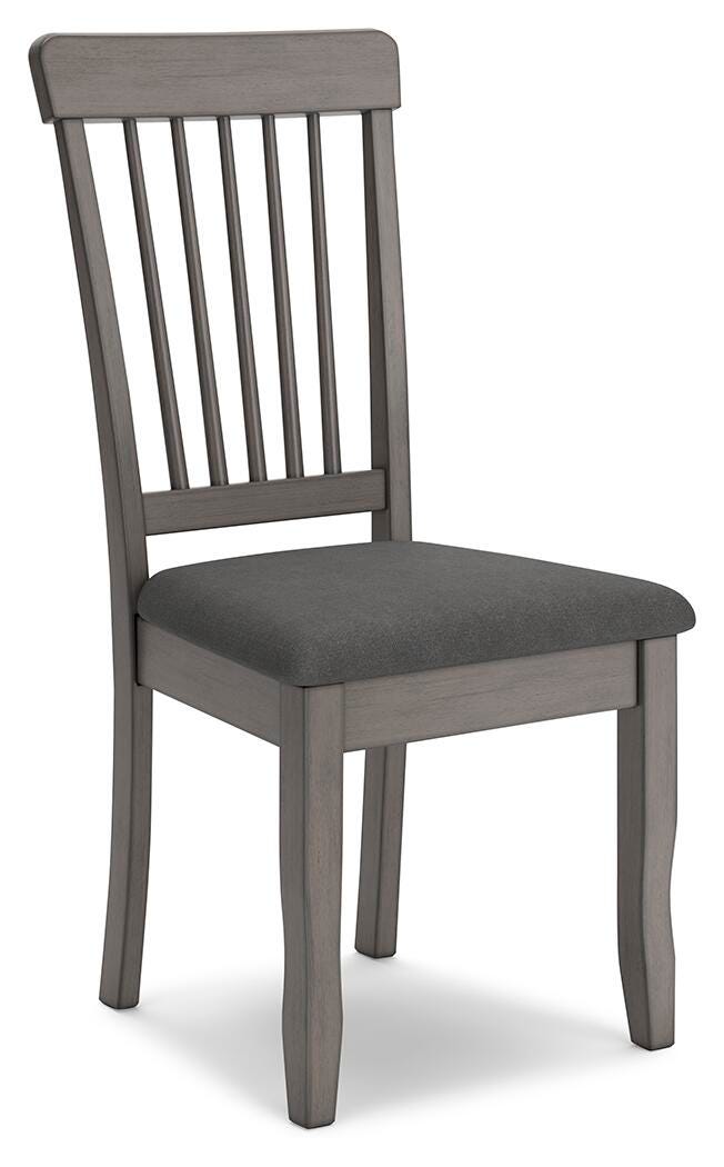 Ashley Furniture Shullden dining room set with a rectangular table and six upholstered chairs, shown from an angled side view.
