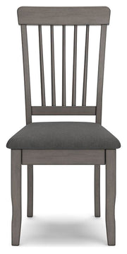 Ashley Furniture Shullden dining room set with a wooden table and matching chairs, shown from a front head-on angle.