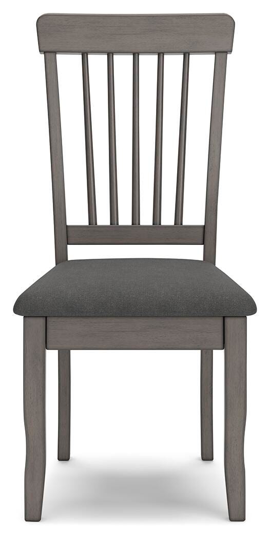 Ashley Furniture Shullden dining room set with a wooden table and matching chairs, shown from a front head-on angle.