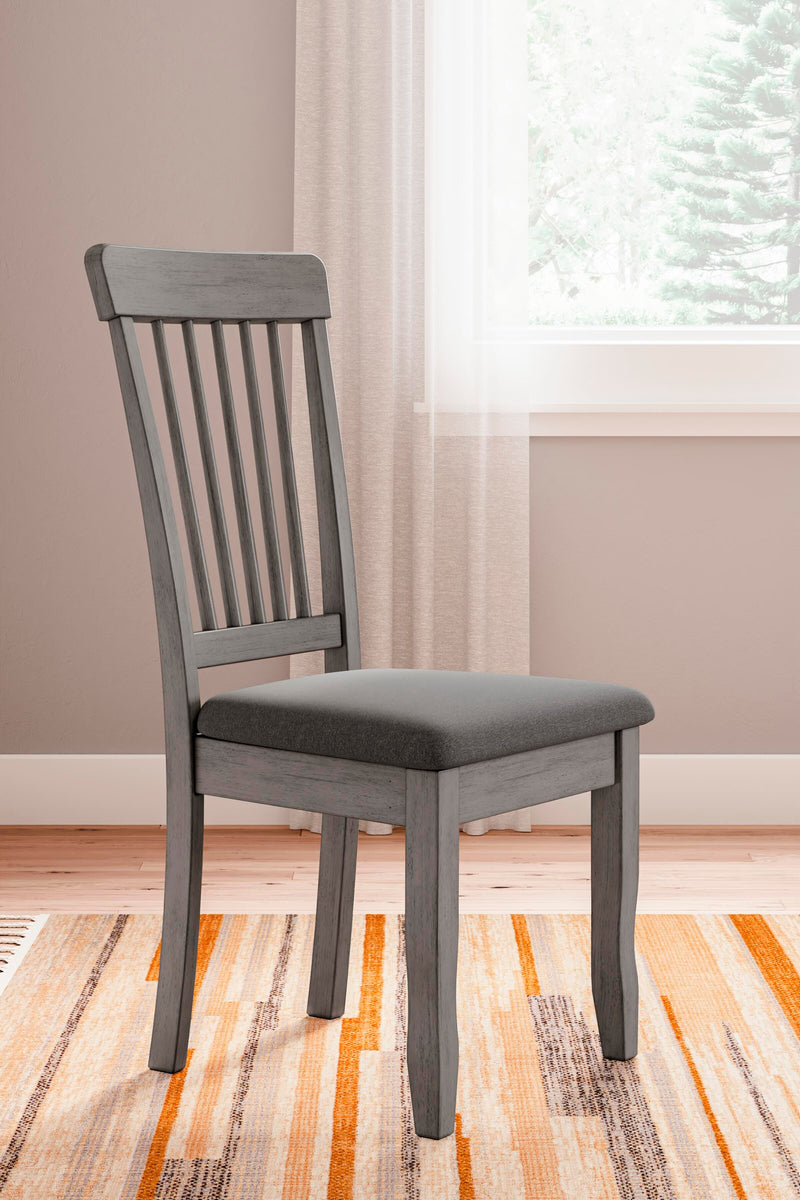 Ashley Furniture Shullden dining room set with a wooden table and six upholstered chairs, modern design for dining areas.