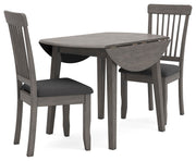 Ashley Furniture Shullden dining room set featuring a wooden table with six matching upholstered chairs in a contemporary style.