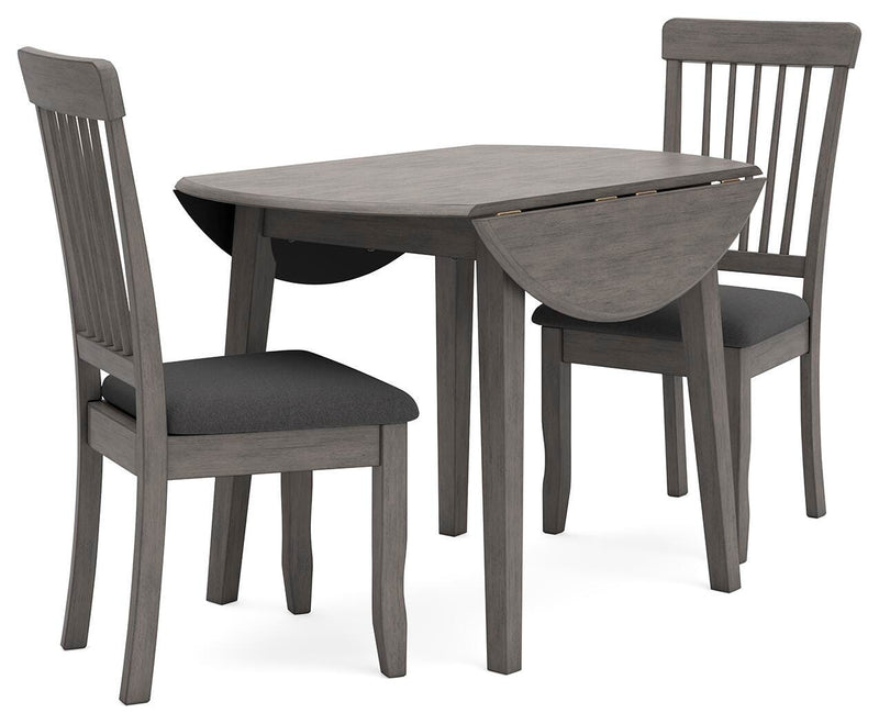 Ashley Furniture Shullden dining room set featuring a wooden table with six matching upholstered chairs in a contemporary style.