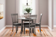 Ashley Furniture Shullden dining room set with wooden table and six upholstered chairs, modern design for dining area.