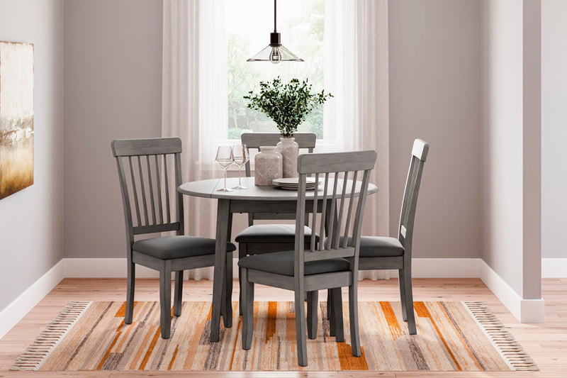 Ashley Furniture Shullden dining room set with wooden table and six upholstered chairs, modern design for dining area.