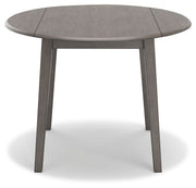 Ashley Furniture Shullden dining room set with a rectangular table and six upholstered chairs, shown from a front head-on view.