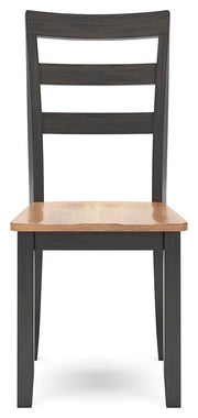 Ashley Furniture Gesthaven dining room set with a wooden table and matching chairs, shown from a head-on angle.