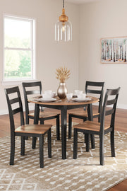 Ashley Furniture Gesthaven dining room set with a wooden table and six upholstered chairs, elegant and traditional in design.
