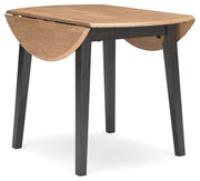 Ashley Furniture Gesthaven dining set with a rectangular table and six upholstered chairs, shown from an angled side view.