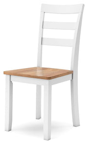 Ashley Furniture Gesthaven dining room set with a wooden table and six upholstered chairs, shown from an angled perspective.