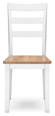 Ashley Furniture Gesthaven dining room set with a wooden table and matching chairs, shown from a head-on angle.