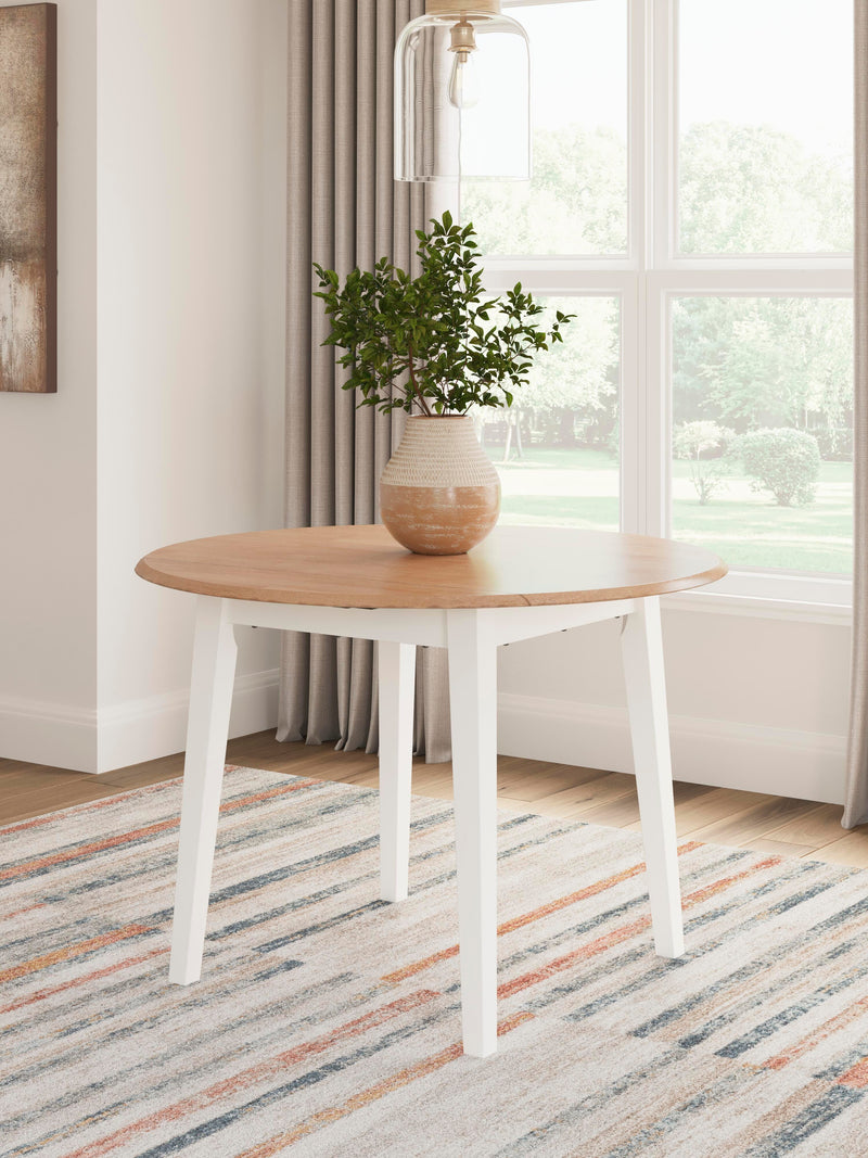 Ashley Furniture Gesthaven dining room set with a wooden table and six upholstered chairs in a classic design.