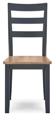 Ashley Furniture Gesthaven dining room set with a wooden table and six matching chairs, shown from a front head-on perspective.