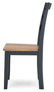 Ashley Furniture Gesthaven dining room set with a wooden table and matching chairs in a modern, elegant design.
