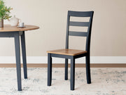 Ashley Furniture Gesthaven dining room set with a wooden table and matching chairs, ideal for elegant dining spaces.