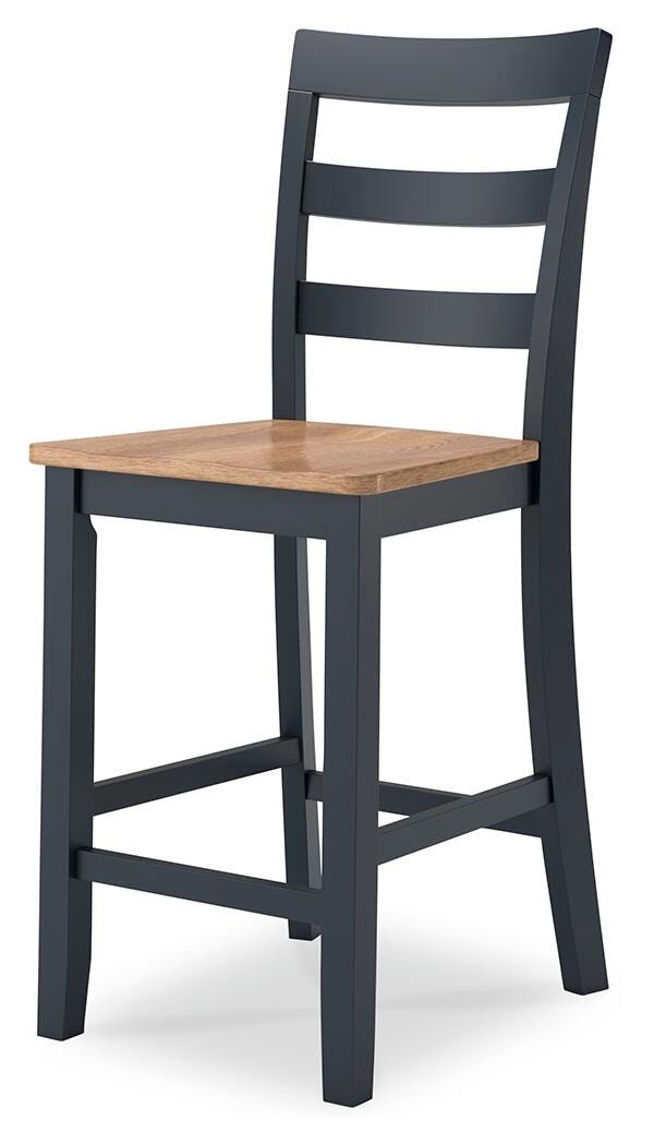 Ashley Furniture Gesthaven dining room set with a wooden table and six upholstered chairs, shown from an angled view.