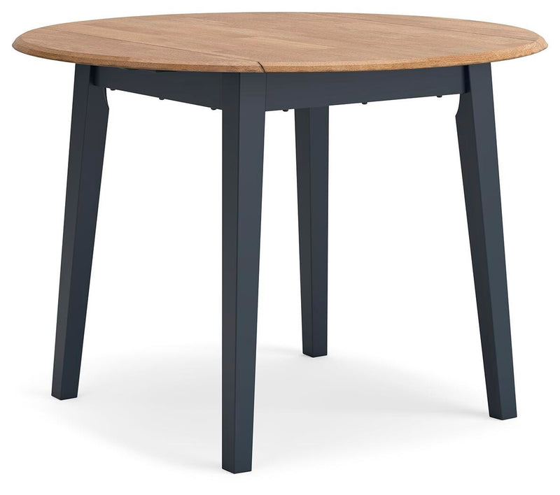 Ashley Furniture Gesthaven dining room set with a wooden table and six upholstered chairs, shown from an angled side view.
