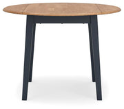 Ashley Furniture Gesthaven dining room set with a wooden table and six upholstered chairs, shown from a head-on angle.