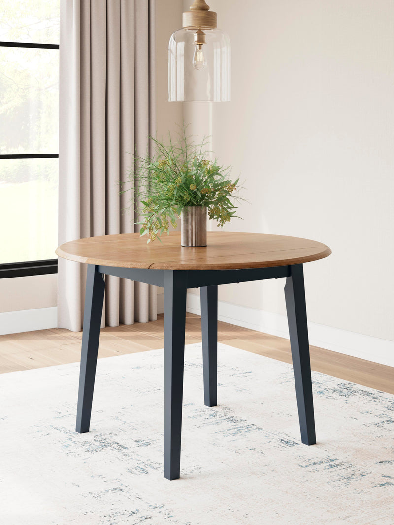 Ashley Furniture Gesthaven dining room set featuring a wooden table and matching chairs in a classic, elegant design.